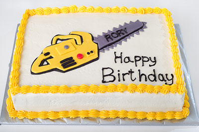 https://www.cremedelacakes.ca - Chainsaw Cake