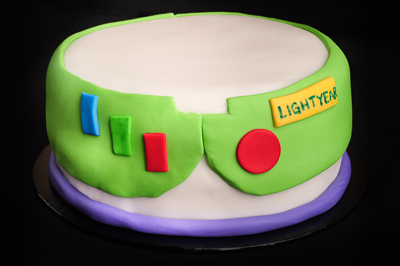 https://www.cremedelacakes.ca - Toy Story Theme Cake